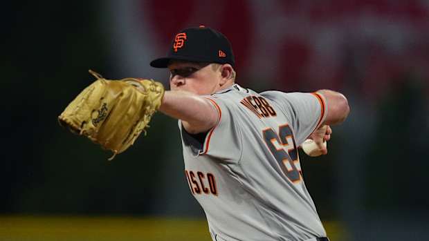 SF Giants pitcher Logan Webb throws a pitch against the Rockies. (2022)